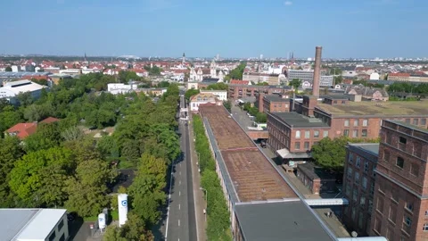 Leipzig spinning mill brick buildings chimney. Amazing aerial view flight drone Video stock 283870216