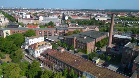 Leipzig spinning mill brick buildings chimney. Nice aerial view flight drone Stock Footage 283870235