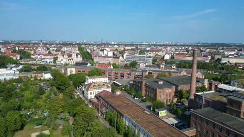 Leipzig spinning mill brick buildings chimney. Great aerial view flight drone Stock Footage 283870276