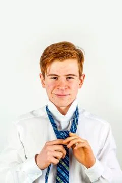 Leisure cool smart boy binding his tie Stock Photos