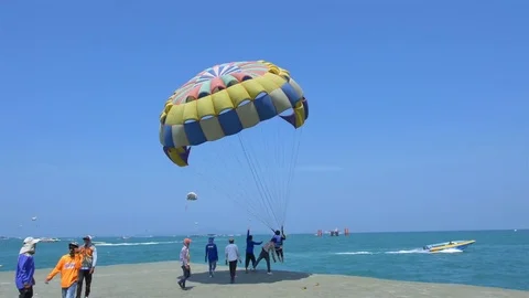 Leisure by playing umbrellas Stock Footage 77904150