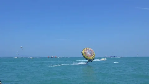 Leisure by playing umbrellas Stock-Footage 77904299