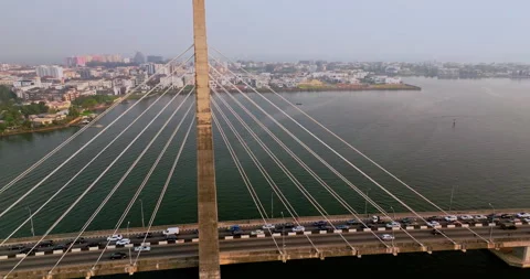 Lekki Ikoyi Link Bridge, Five Cowries Creek, Ikoyi and Lekki Cityscape Stockbeeldmateriaal 302348670