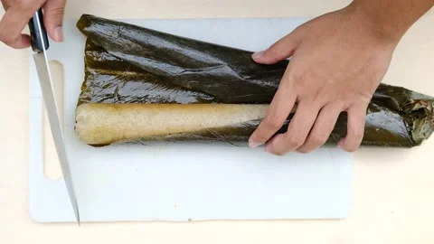 Lemang cutting for Eid Mubarak Stock Footage 157566211