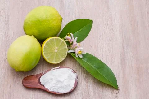 Lemon and baking soda on the table Stock Photos