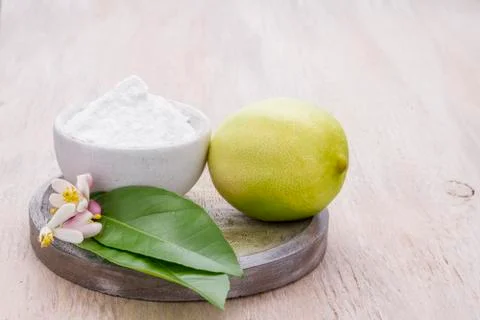 Lemon and baking soda on the table Stock Photos