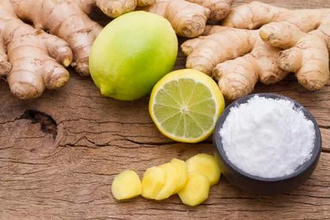 Lemon and baking soda on the table Stock Photos