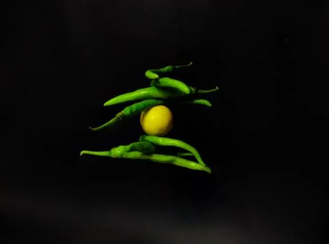 Lemon and Chilies Stock Photos