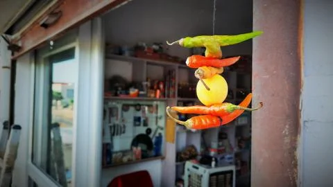 Lemon and chilli outside a workshop as superstition Stock Photos