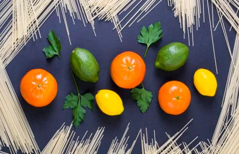 Lemon and lime on a black background. Stock Photos