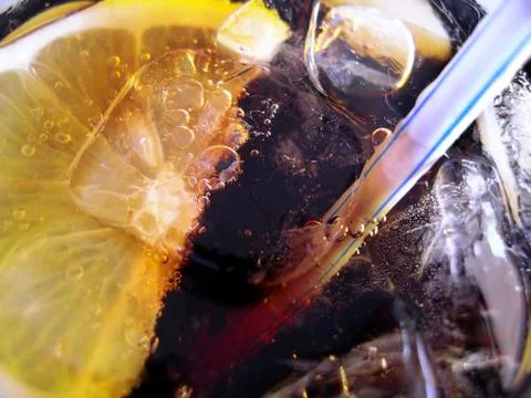 Lemon and straw Stock Photos