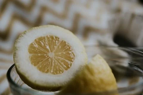 Lemon and tea bags at the table Stock Photos