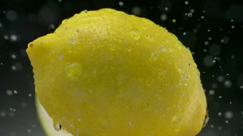 Lemon and water splash, Slow Motion Stock Footage 9291252