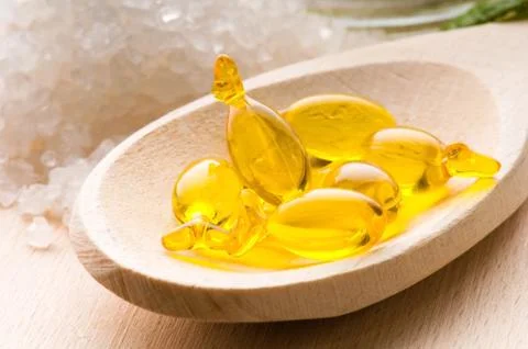 Lemon bath - bath salt, capsule and fresh fruits Stock Photos