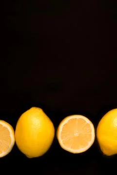 Lemon on a black background Stock Photos