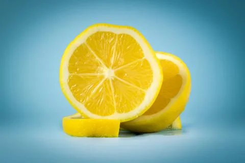 Lemon on blue background 스톡 사진