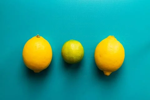 Lemon on a blue background Stock Photos