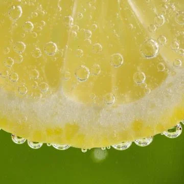 Lemon in the bubbles Stock Photos