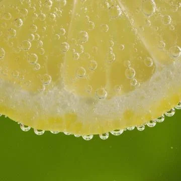Lemon in the bubbles Stock Photos