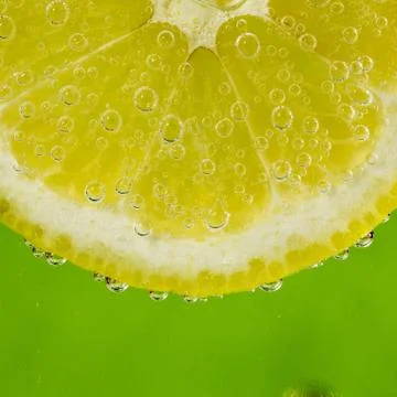 Lemon in the bubbles Stock Photos