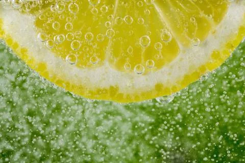 Lemon in the bubbles Stock Photos