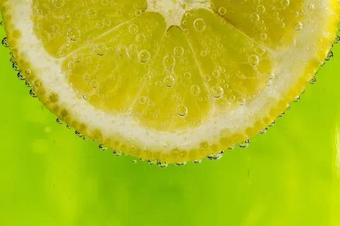 Lemon in the bubbles Stock Photos