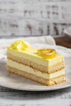 Lemon cake. Lemon slice cake on a plate. Close up Stock Photos