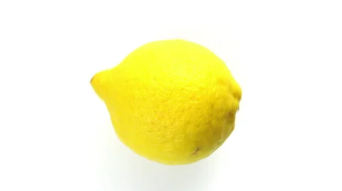 Lemon changing colors, rotating, upper view Stock Footage 34506511