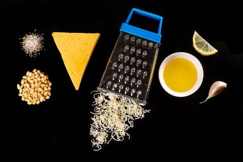 Lemon, cheese, pine nuts, olive oil and grater, top view Stock Photos
