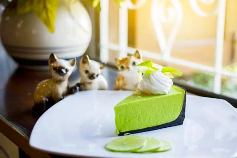 Lemon cheesecake with mint Stock Photos
