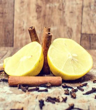 Lemon with cinnamon. Stock Photos