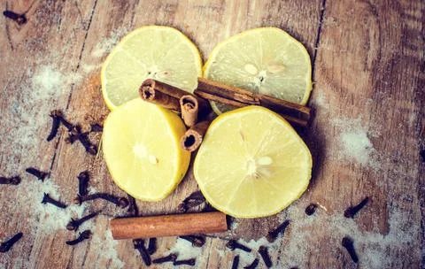 Lemon with cinnamon. Stock Photos