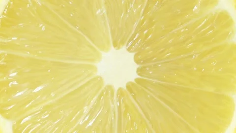 Lemon citrus fruit cut in the middle, rotating Stock-Footage 165414564