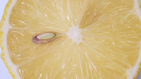 Lemon close-up. rotating lemon slices close-up slow mo Stock Footage 167819112