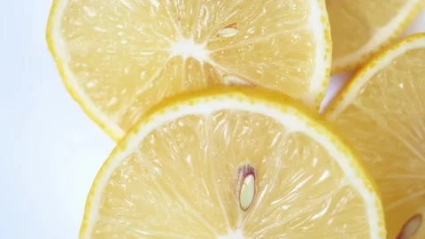 Lemon close-up. rotating lemon slices close-up slow mo. Stock Footage 169007424