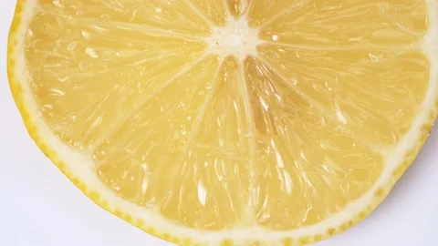 Lemon close-up. rotating lemon slices close-up slow mo Stock Footage 172433269