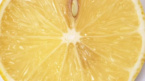 Lemon close-up. rotating lemon slices close-up slow mo Stock Footage 201339200
