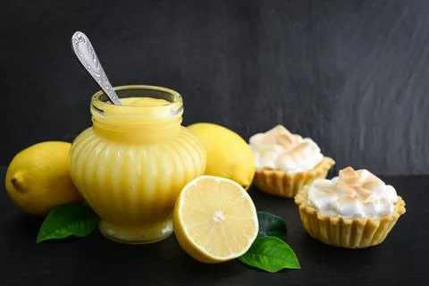 Lemon curd in jar Stock Photos