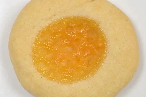 Lemon curd thumbprint cookie close up Stock Photos