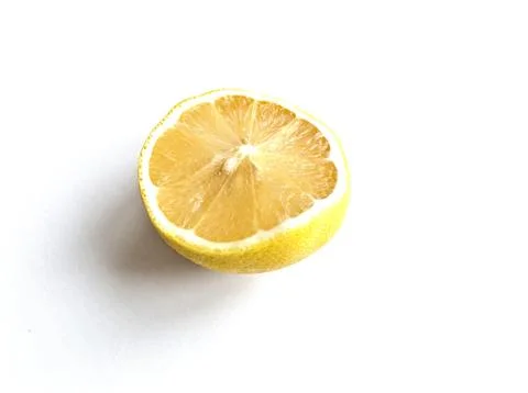 A lemon is cut in half and the inside is shown Foto stock