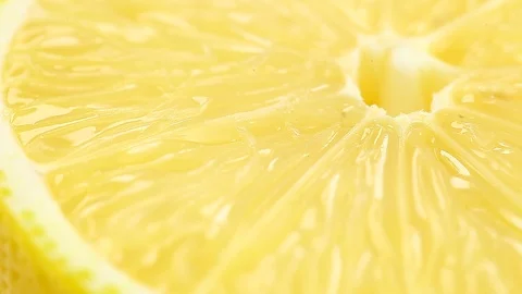 Lemon cut rotates, yellow core fresh citrus fruit Stock Footage 122812908