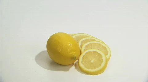 Lemon cut spin close2 Stock Footage 630487