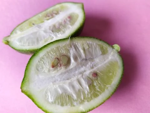 Lemon cut into two pieces Stock Photos
