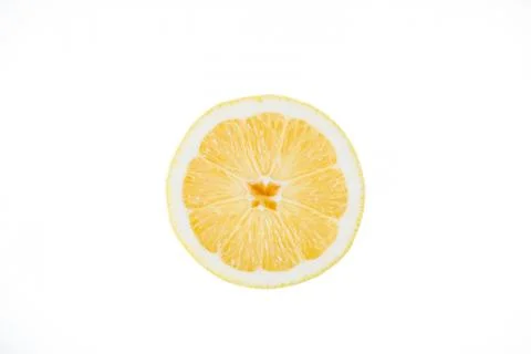 Lemon in a cut on a white background Stock Photos