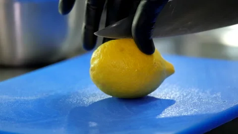 Lemon on the Cutting Board Stock Footage 131365566