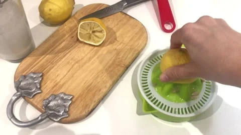 Lemon Drink Preparation In Kitchen Fresh Citrus Beverage Close-Up Stock-Footage 331944014