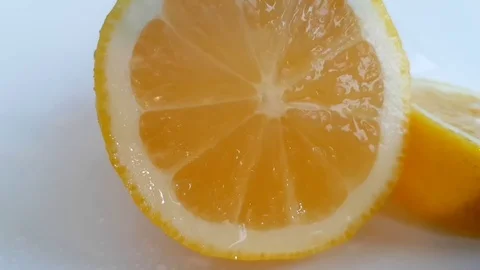 Lemon drips water slow-motion Stock Footage 89815670