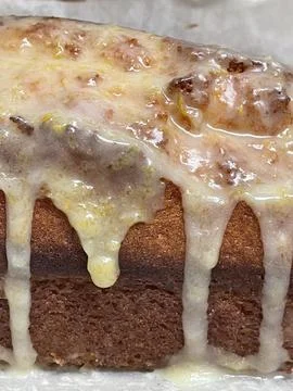 Lemon drizzle cake. Stock Photos