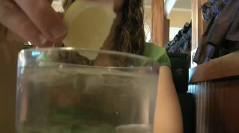Lemon Dropped into Water Video stock 12592801