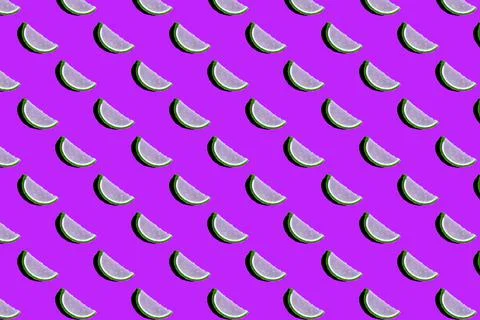 Lemon drops pattern on purple background Stock Photos